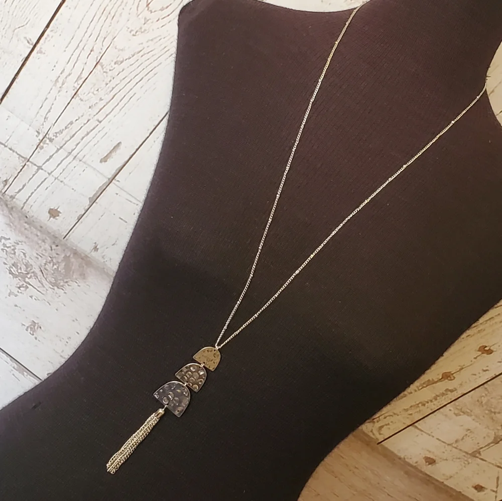Time and Tru silvertone necklace with textured metal pendant with tassle